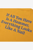 PASS~PORT HAMMER & NAIL TEE - GOLD