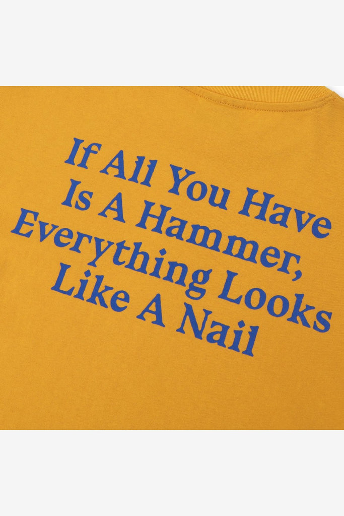 PASS~PORT HAMMER & NAIL TEE - GOLD
