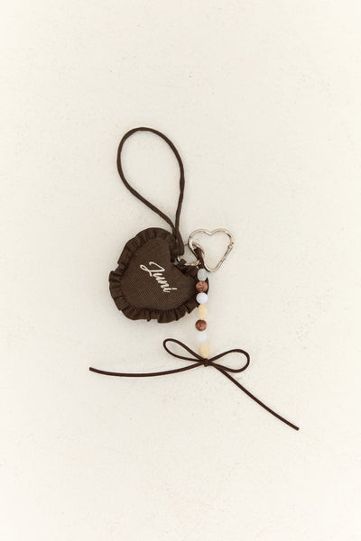 Juni Heart Bag Charm - Espresso Check - lifestyle shot