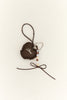 Juni Heart Bag Charm - Espresso Check - lifestyle shot
