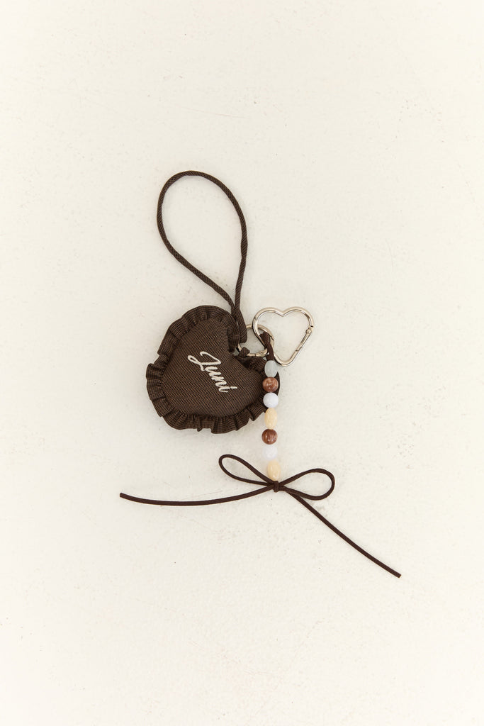 Juni Heart Bag Charm - Espresso Check - lifestyle shot