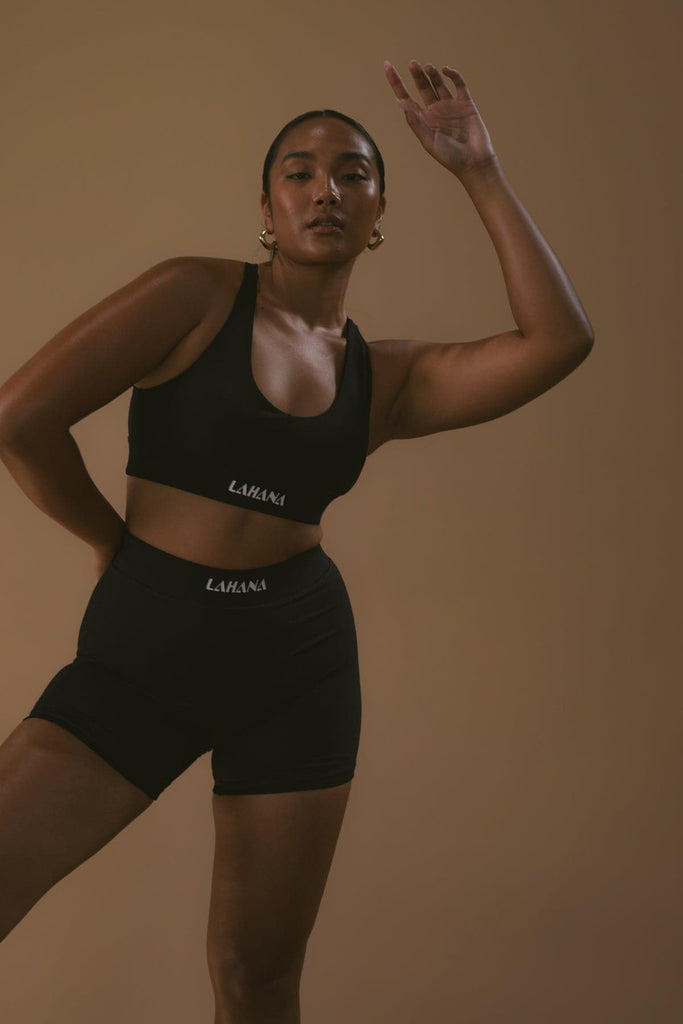 A model wearing the Lahana Active Sanaa Crop Top in Black.